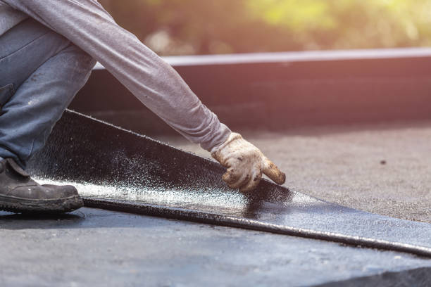 Professional Exterior Waterproofing technician working in Woodland, MI